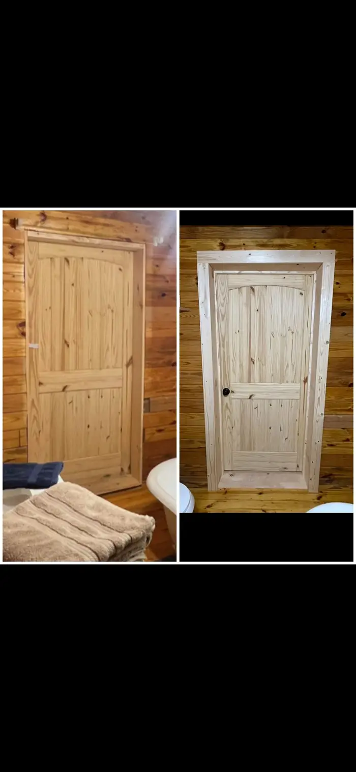 Knotty pine interior doors, one arched and one panelled, hung in a wood-lined room